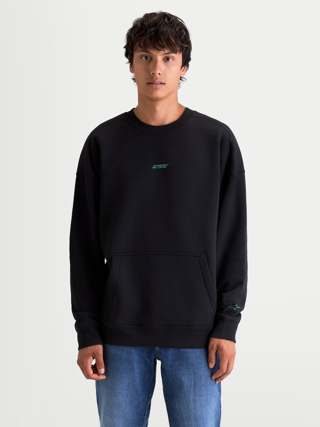 Alpinestars Guise Oversized Crew, Black Motorsport-Inspired Sportswear Pullover, relaxed fit fleece sweatshirt with kangaroo pocket and embroidered Astars logos, on-model front view.