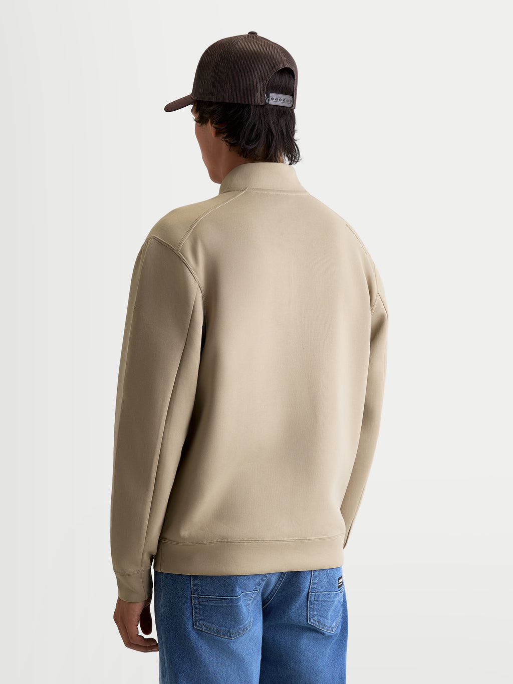 Alpinestars Sweatshirt Demi-Zip Apera, pull sportswear pour homme, beige, vue de dos sur mannequin mettant en avant les coutures de manches raffinées et le col montant, construction en polaire tri-mélange double face.