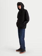 Alpinestars Sweat à capuche Textured Oversize Camino, sweat à capuche sportswear pour homme, noir, polaire texturée en maille sergée avec col haut et poche kangourou, coupe ample inspirée du sport automobile.