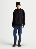 Alpinestars sweat à capuche texturé oversize Camino, sweat à capuche de sportswear pour homme, noir, polaire en maille sergée texturée avec col montant et poche kangourou, silhouette décontractée