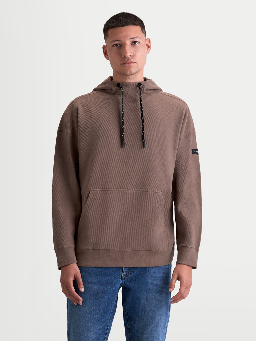 Alpinestars Camino Textured Oversized, sweat à capuche de sportswear pour homme et femme, marron taupe, polaire texturée en maille sergée avec col montant et poche kangourou