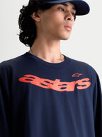 Alpinestars Velocifier CSF, t-shirt à manches longues pour homme, bleu marine et orange, avec graphisme Astars incurvé sur la poitrine, style sportswear inspiré du sport automobile