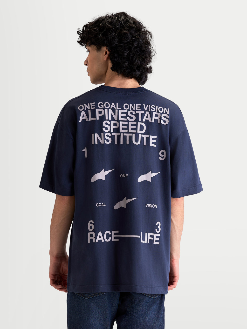 Alpinestars Institute Oversized SS CSF Tee, t-shirt de sportswear à manches courtes pour homme, bleu marine et blanc, vue de dos avec un grand graphique blanc Speed Institute et Race-Life 1963, coupe oversize décontractée.