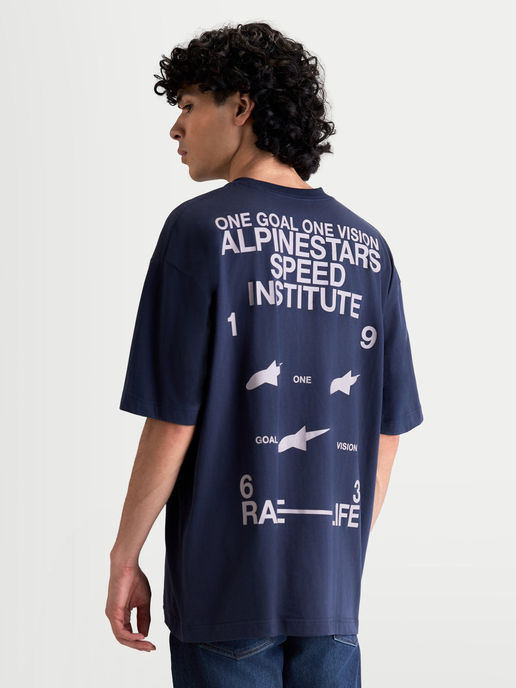 Alpinestars Institute Oversized CSF Tee, t-shirt sportswear à manches courtes pour homme, bleu marine et blanc, vue de dos avec graphiques Alpinestars Speed Institute et One Goal One Vision, coupe oversize décontractée