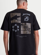 Alpinestars t-shirt Checkback Oversized CSF, t-shirt de sportswear noir, vue de dos sur modèle montrant un grand graphique gris avec logos Astars, texte Alpinestars et slogan One Goal One Vision, coupe oversize, mélange coton et polyester