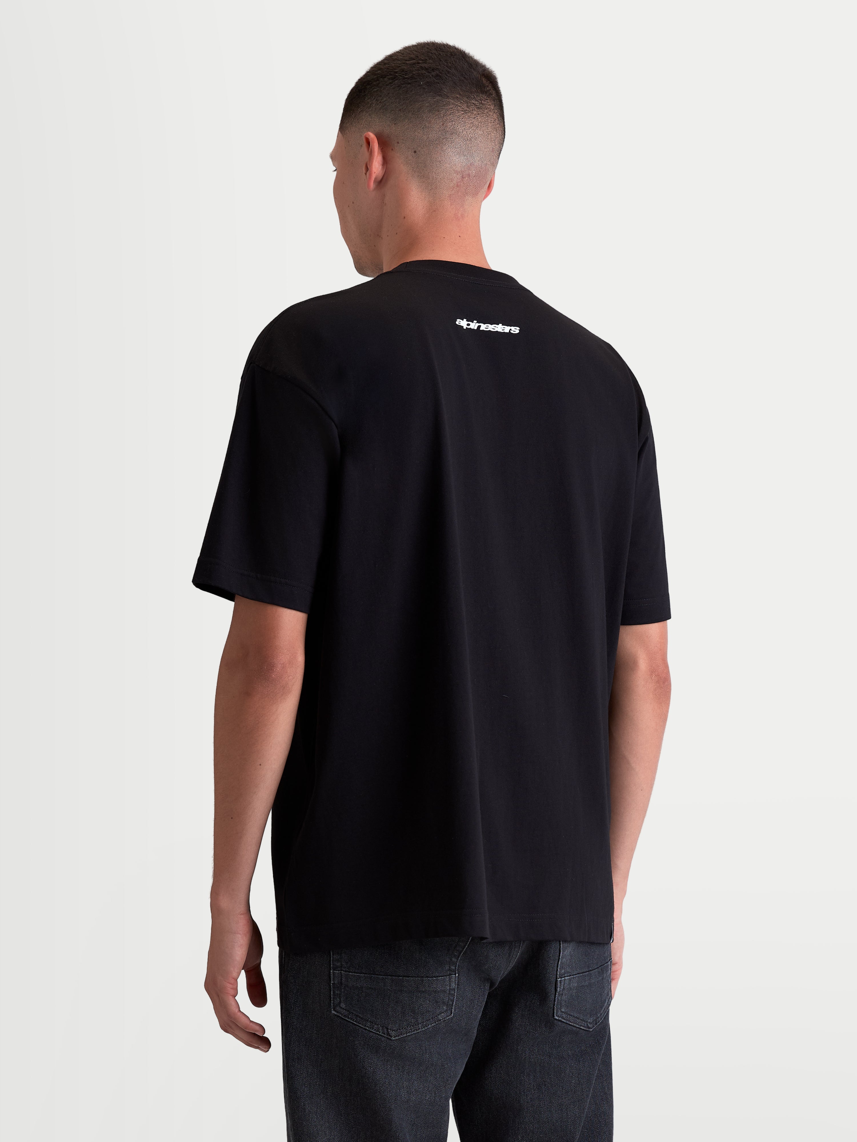 Alpinestars T-Shirt Prelude Oversized CSF, t-shirt de sportswear à manches courtes pour homme, noir et blanc, vue de dos avec logo Alpinestars blanc, coupe oversize décontractée.
