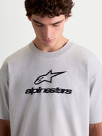 Alpinestars Prelude Oversized CSF, t-shirt sportswear à manches courtes pour homme, gris ciment avec logo Astars noir sur la poitrine, coupe oversize décontractée en mélange de coton et polyester