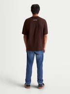 Alpinestars Prelude Oversized CSF, t-shirt sportswear à manches courtes pour homme, marron, vue de dos sur mannequin montrant un petit logo Alpinestars blanc sur la nuque, coupe oversize décontractée