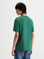 Alpinestars T-shirt Singular CSF, t-shirt sportswear à manches courtes pour homme, vert, vue de dos sur modèle, mélange de coton et polyester, style motorsport décontracté