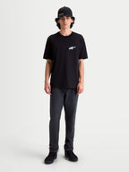 Alpinestars T-Shirt Meteor CSF, t-shirt à manches courtes pour homme, noir et blanc, style sportswear décontracté en mélange coton-polyester, avec un logo Astars blanc sur la poitrine.