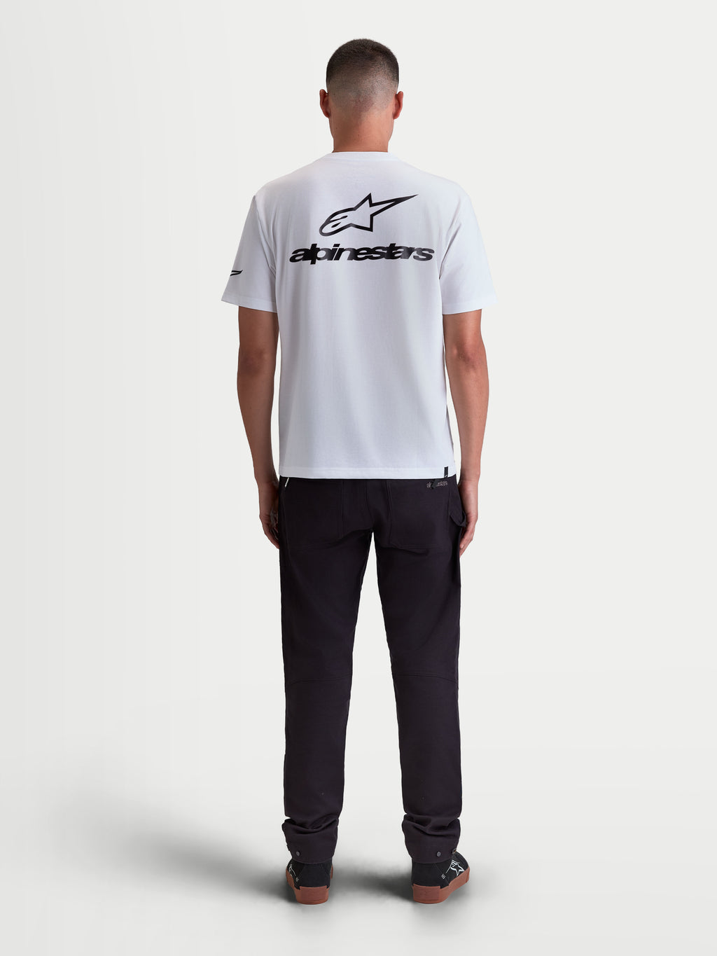 Alpinestars Combo Back CSF Tee, Short Sleeve Sportswear T-Shirt for Men, White and Black, Cotton-Poly blend, Back View on model showing large black Astars logo graphic.