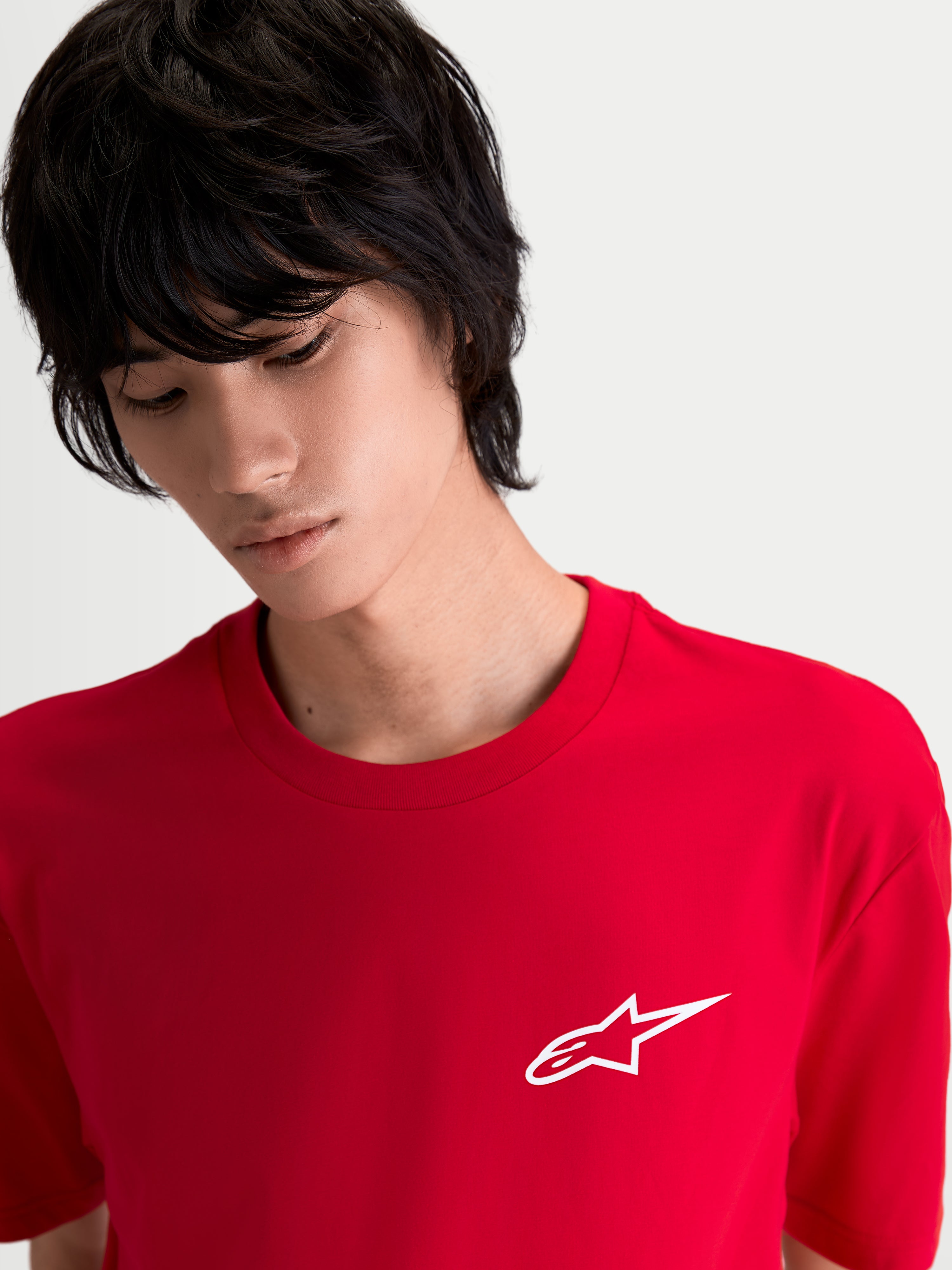 Alpinestars Combo Back CSF Tee, Red Short Sleeve Sportswear T-Shirt on model, featuring a small white Astars logo on the chest, premium cotton-poly blend for everyday comfort.