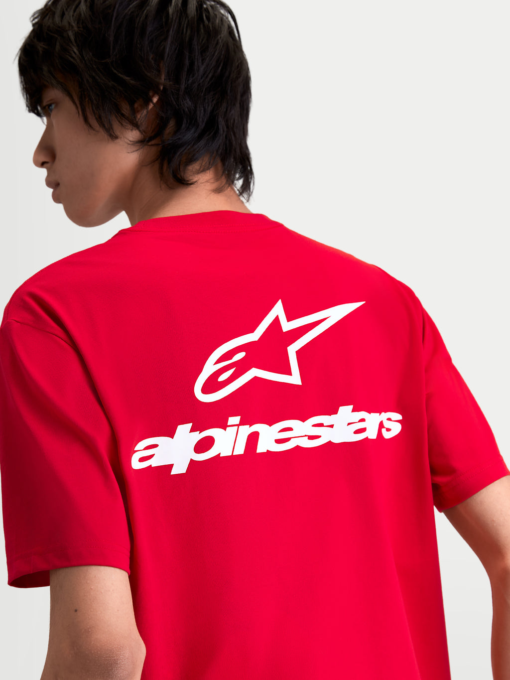 Alpinestars Combo Back CSF Tee, Sportswear Short Sleeve T-Shirt, Red and White, featuring a large white Astars logo and wordmark on the back, on-model view.
