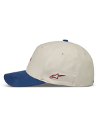 Alpinestars County Canvas Casquette, casquette sportswear sable et bleue de profil, visière courbée et logo Astars rouge.