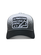 Alpinestars Gravel Trucker, casquette trucker noire et blanche avec patch tissé Racing Ahead et imprimé texture gravier.