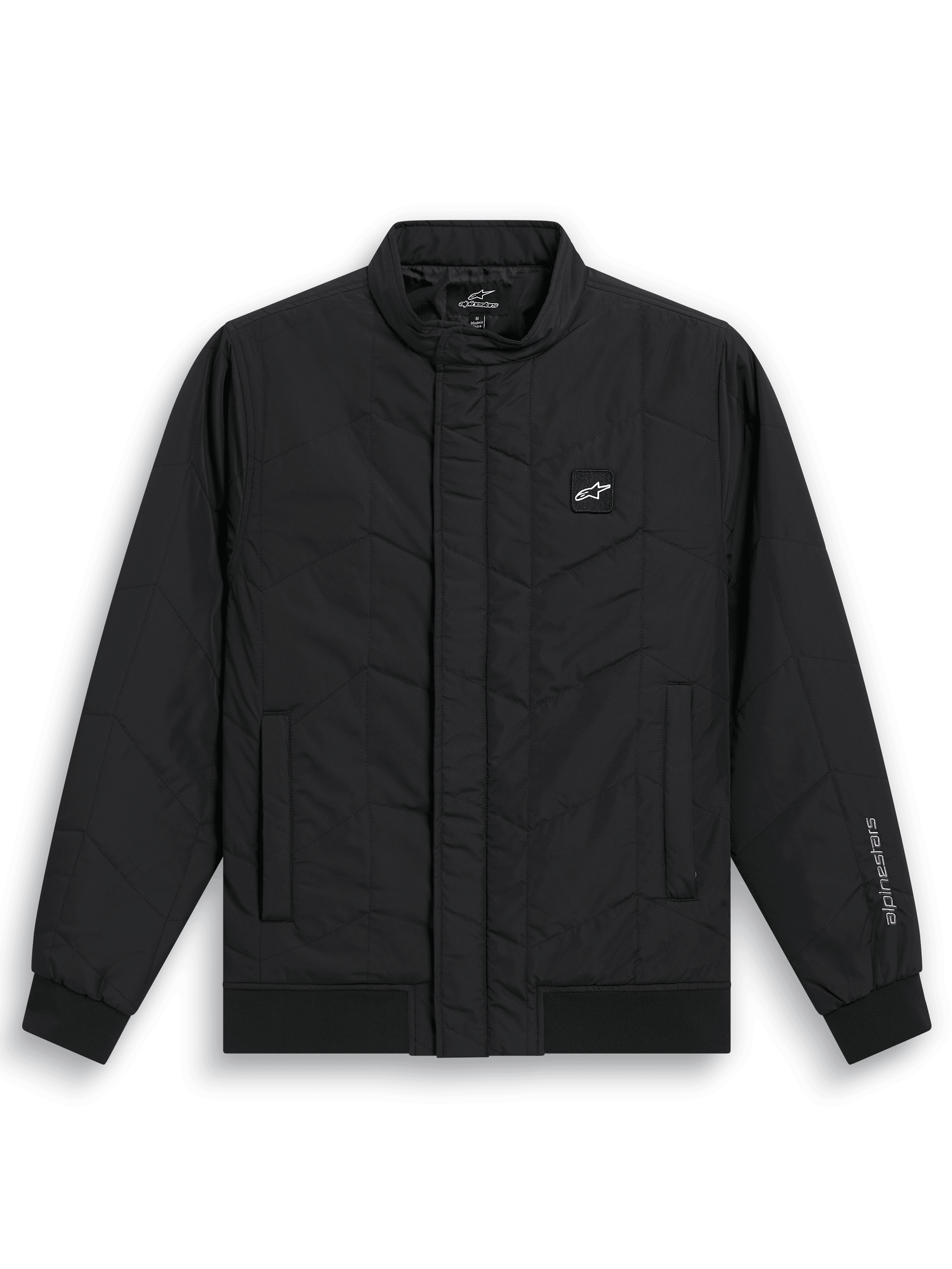 Veste Alpinestars Precedent, veste de sport matelassée noire inspirée de la F1, avec motif matelassé en angle, col bas, poignets et ourlet côtelés, petit écusson logo sur la poitrine et broderie sur la manche, design décontracté inspiré du sport automobile