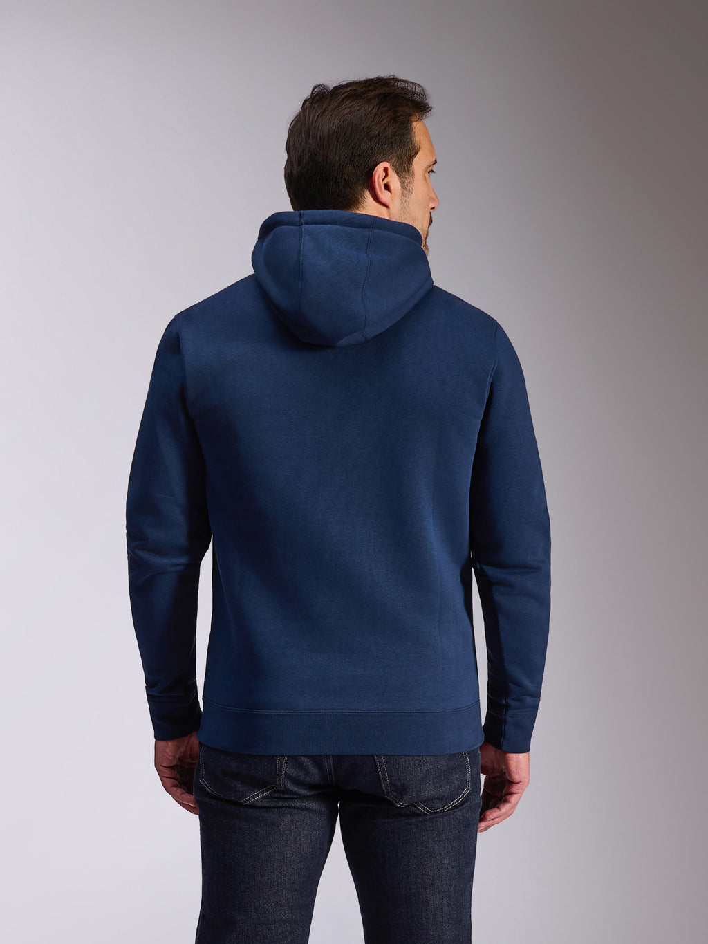 Sweat à capuche Alpinestars Ride V3, polaire à enfiler bleu marine, vue de dos montrant un design bleu uni avec capuche doublée de jersey, poignets et ourlet en bords-côtes, vêtement streetwear décontracté