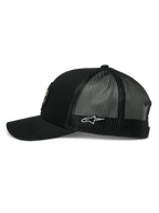 Casquette Trucker Gambit Alpinestars, noire, vue latérale montrant la visière courbée et le dos en maille, logo étoile Alpinestars blanc sur le côté, accessoire décontracté inspiré des sports mécaniques