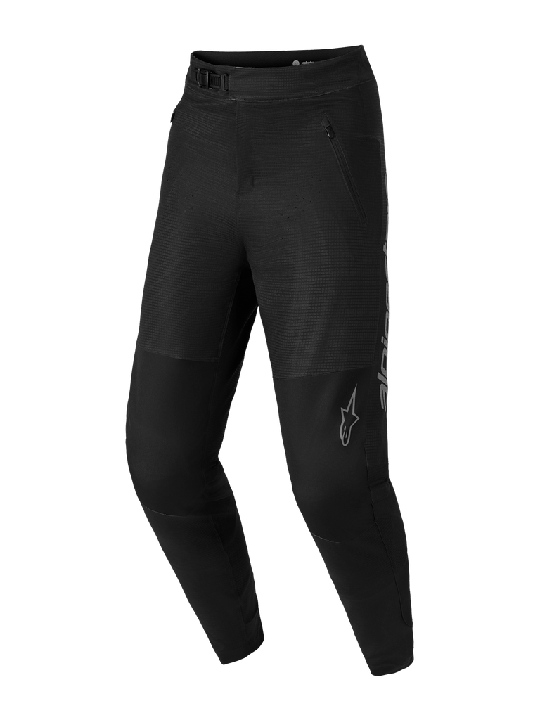 Black A-Dura Elite Flex MTB Pants featuring 4-way stretch fabric, ratchet waist closure, and grey Alpinestars logos.