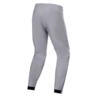 Pantalon imperméable Alpinestars A-Dura, pantalon de VTT, gris titanium, vue arrière, avec jambes fuselées et poignets élastiqués noirs, design technique minimaliste pour le VTT