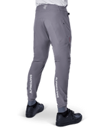 Alpinestars A-Aria Elite Pants, MTB Pants, Dark Gray, featuring vertical white Alpinestars logos on the back of the lower legs, laser-cut ventilation holes, elasticated cuffs, and a performance fit for mountain biking