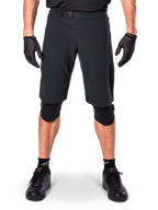 Alpinestars A-Aria Elite Shorts, Mountain Bike Shorts, Black, worn with knee pads and black gloves, featuring laser-cut ventilation and an adjustable buckle waist, performance off-road cycling gear