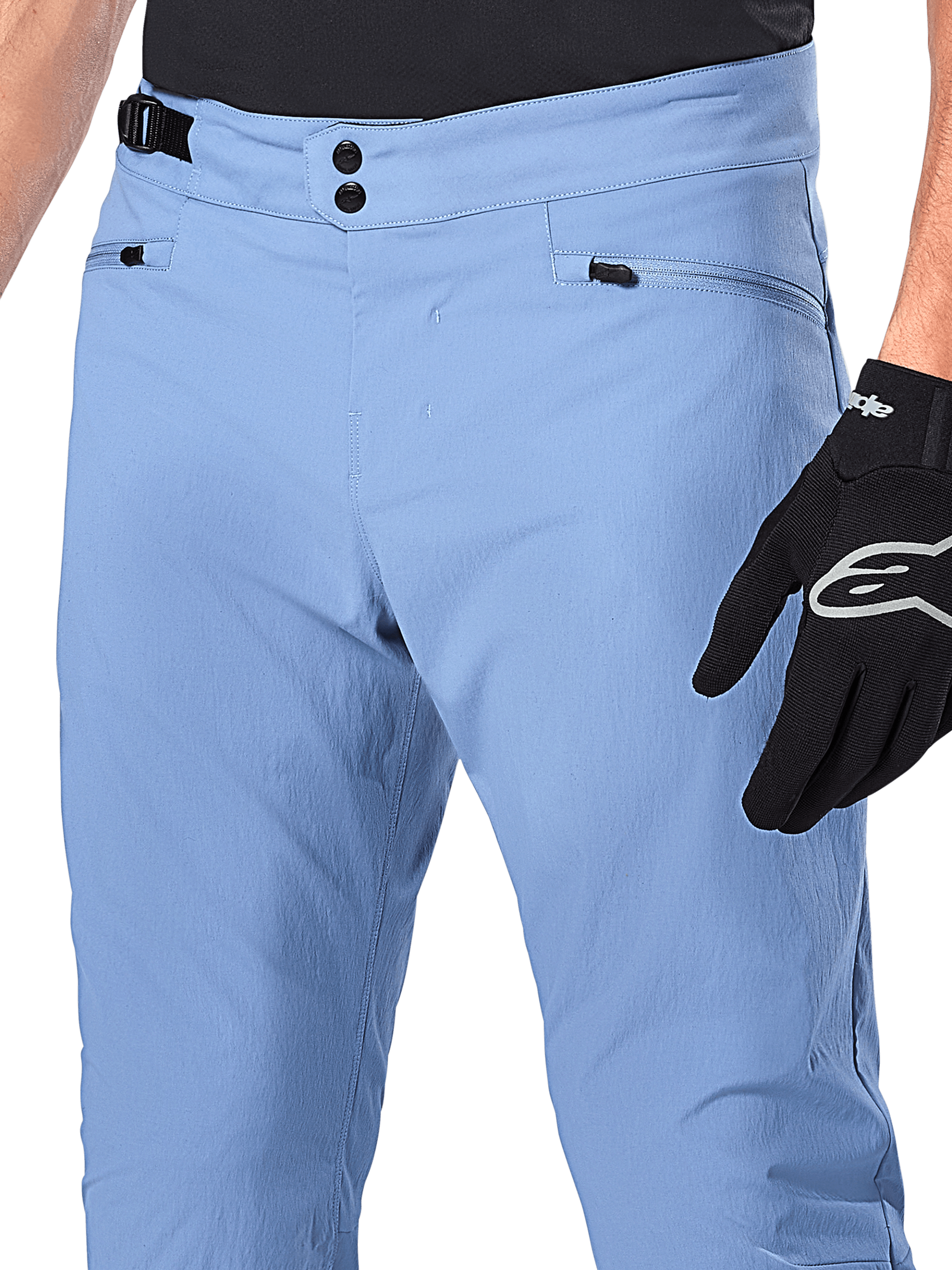 Alpinestars A-Dura Pants, MTB Cycling Pants, Infinity Blue, close-up of waist featuring double snap closure and side cinch adjuster, zippered pockets, worn with black Alpinestars gloves