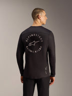 Maillot noir A-Dura Air à manches longues, vue arrière avec logo Alpinestars Racing Ahead et tissu mesh respirant.
