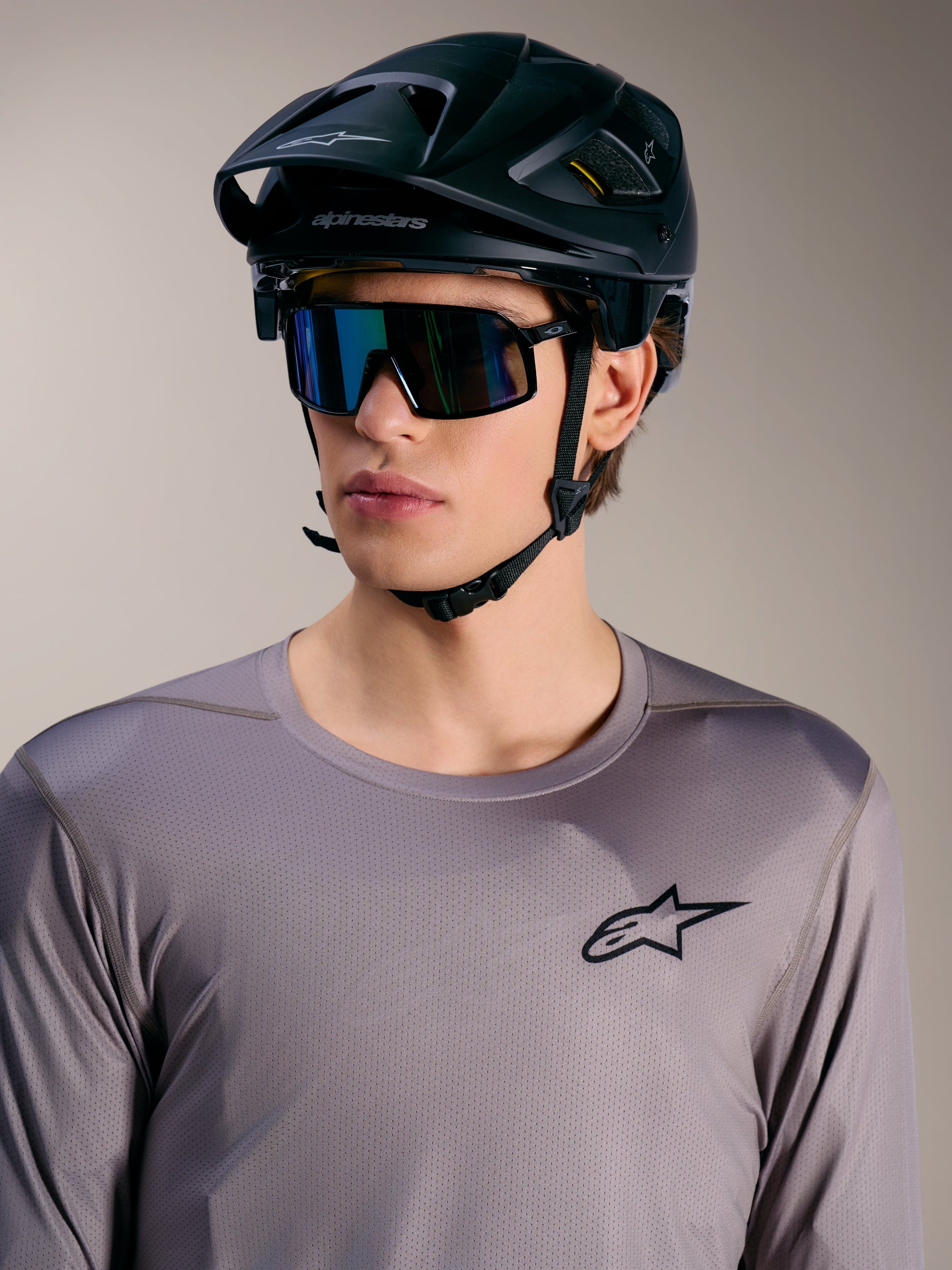 Gray A-Dura Air Long Sleeve Jersey for mountain biking, featuring breathable mesh construction and an Astars chest logo.