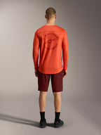 Maillot A-Dura Air orange et short Ride bordeaux, vue arrière de l'équipement de VTT performant Alpinestars.