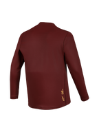 Maillot A-Dura Ride manches longues bordeaux, tissu jacquard haute performance et logo jaune Alpinestars au dos.