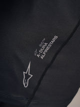 Black A-Dura Ride Short Sleeve Jersey detail featuring a silver Alpinestars logo and A-Dura wordmark on technical fabric.