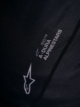 White Astars logo and A-DURA wordmark printed on the black A-Dura Ride Jersey, featuring technical jacquard mesh detail.