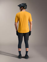 Orange A-Dura Ride Short Sleeve Jersey, back view showing dropped tail and logo detail for casual mountain bike style.