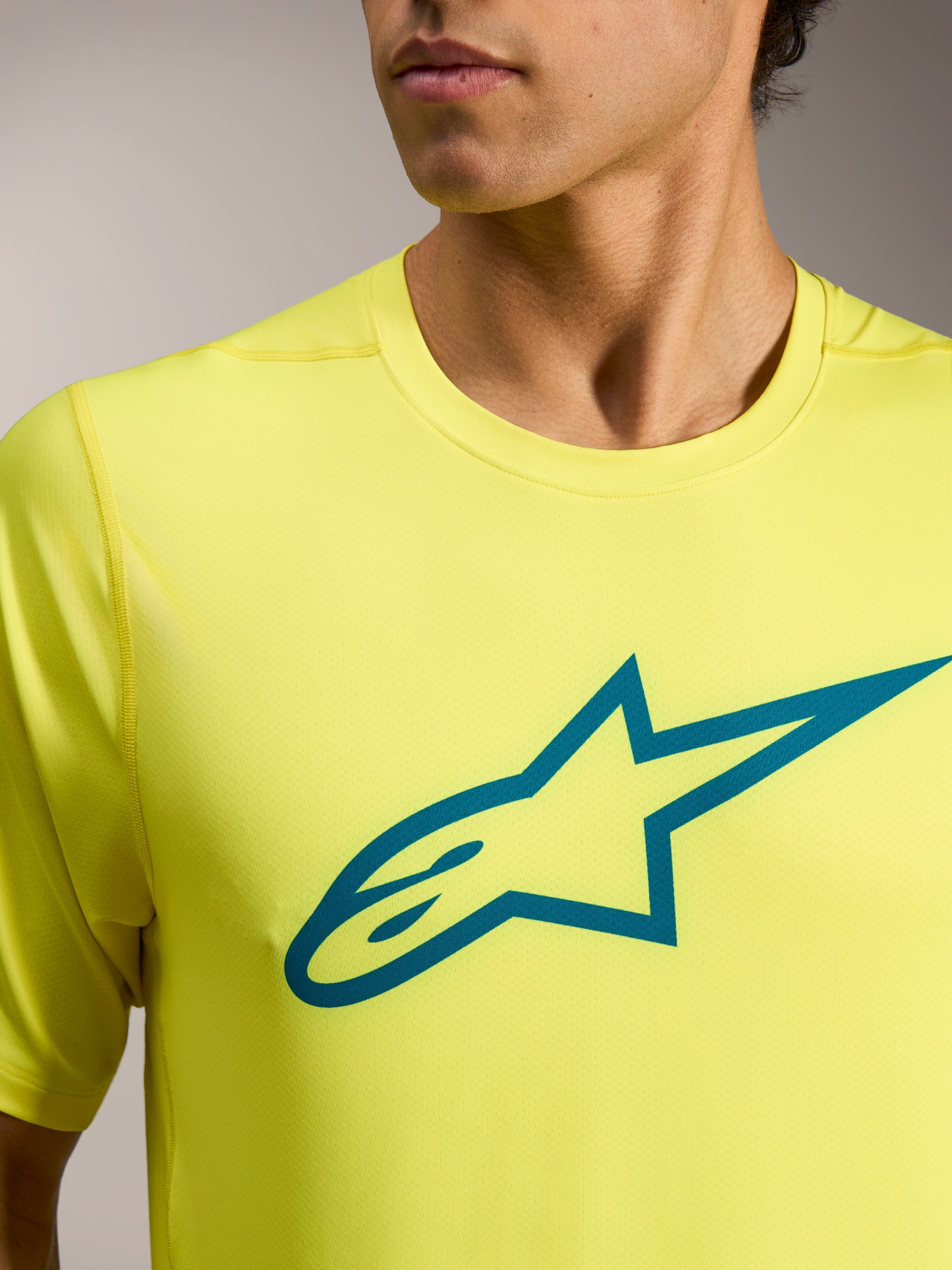 Maillot Alpinestars A-Dura Ride jaune fluo, manches courtes avec logo Astars sarcelle, vêtement technique léger pour VTT