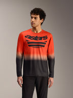Maillot A-Dura ASTARS 2.0 à manches longues, dégradé orange et noir avec graphisme poitrine pour la performance en VTT.