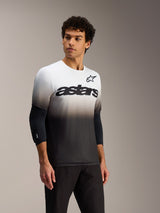 Maillot VTT A-Dura ASTARS 2.0 dégradé blanc et noir, manches courtes avec logo astars sur la poitrine.