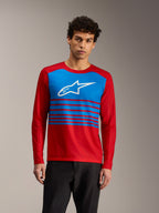 Maillot à manches longues A-Dura Elite 2.0 rouge avec bloc bleu, logo Alpinestars blanc et rayures pour VTT trail.