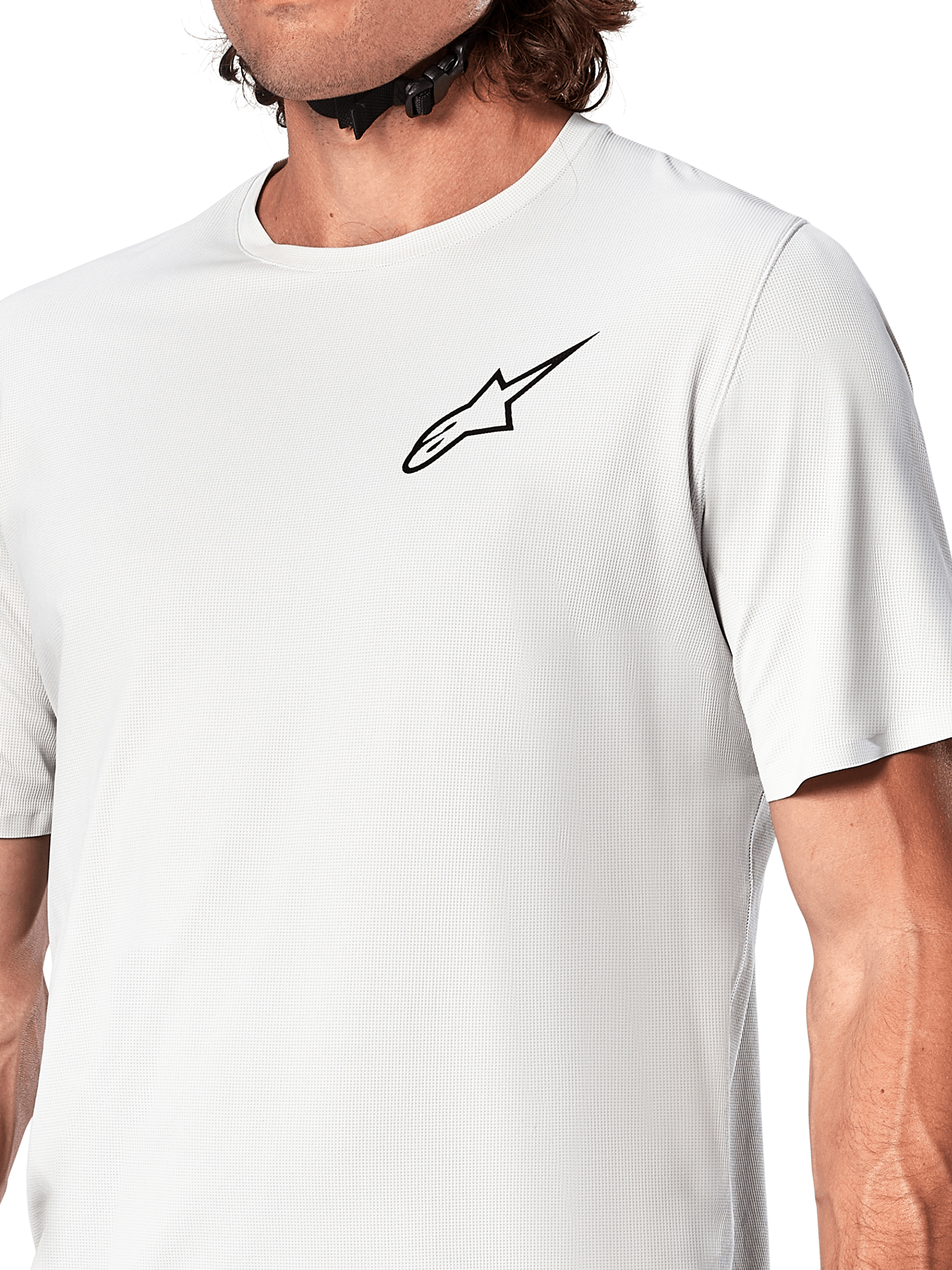 Alpinestars A-Aria Astar Jersey, Short Sleeve Cycling Jersey, White Dove, close-up view featuring a black Astar logo on the chest, breathable textured polyester material, lightweight performance fit for mountain biking