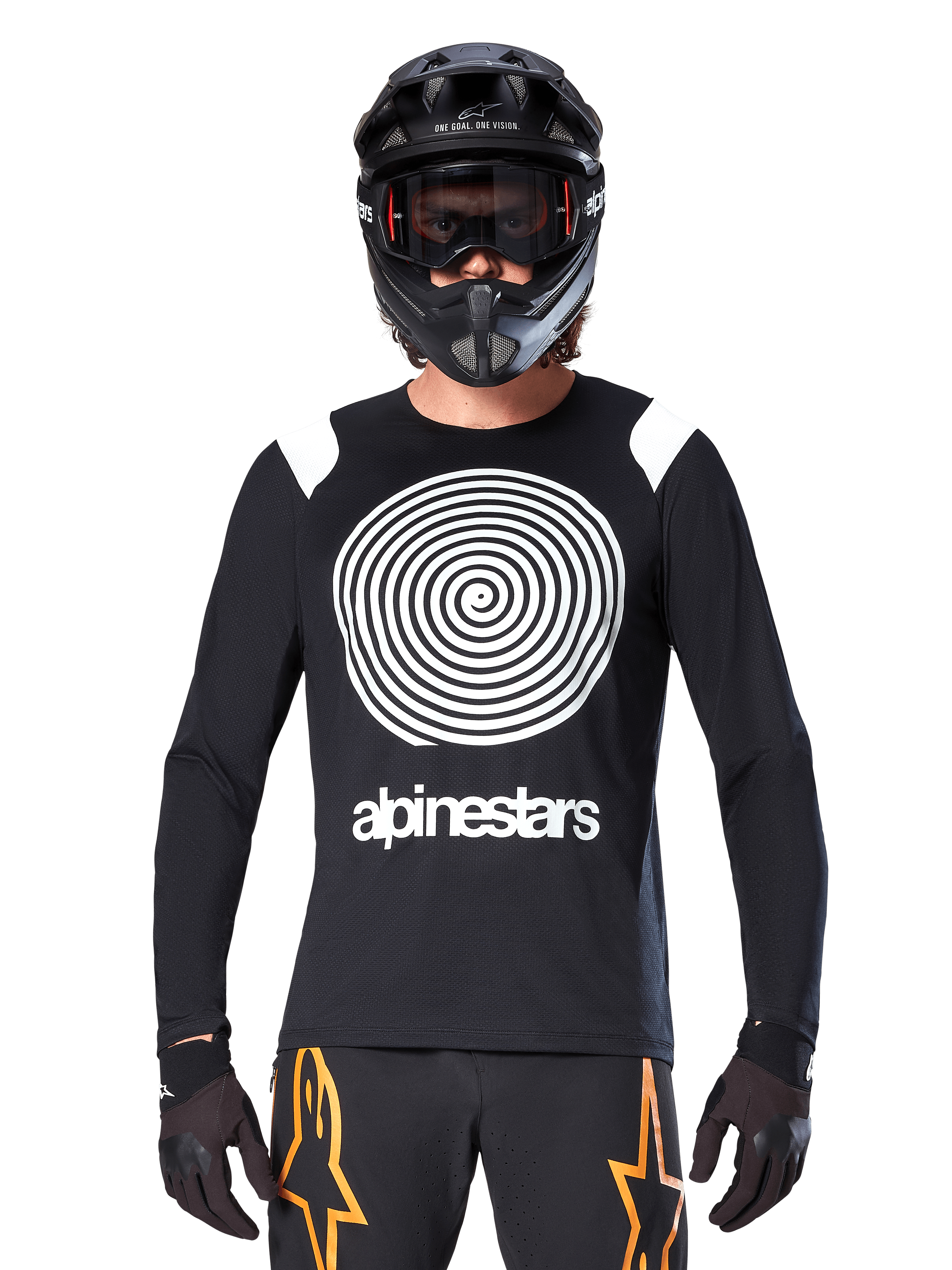 Alpinestars A-Supra Oscar Long Sleeve Jersey, Black with white spiral graphic and shoulder accents, worn by a rider with a black full-face helmet and goggles, black and orange pants, performance cycling gear for MTB gravity riding