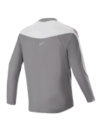 Maillot Alpinestars A-Supra Race - Manches longues, maillot de VTT, gris foncé et blanc, vue arrière avec petit logo étoile, graphismes rouges sur les épaules et coupe performance pour la course tout-terrain