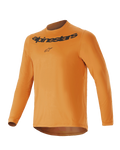 Maillot à manches longues Alpinestars Youth A-Dura Rocker, or foncé, avec logo et inscription Alpinestars noirs sur la poitrine, col rond, pan arrière allongé, vêtement de VTT de performance léger