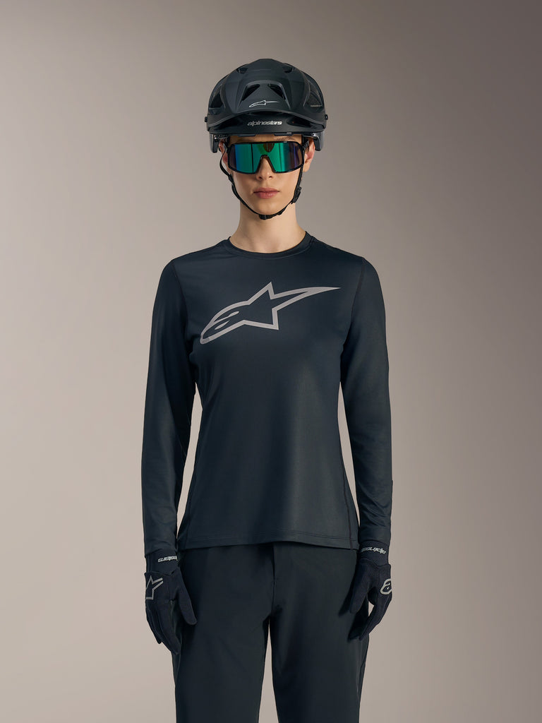 Maillot Stella A-Dura Ride femme, haut de VTT noir à manches longues avec logo Astars gris et coupe performance.