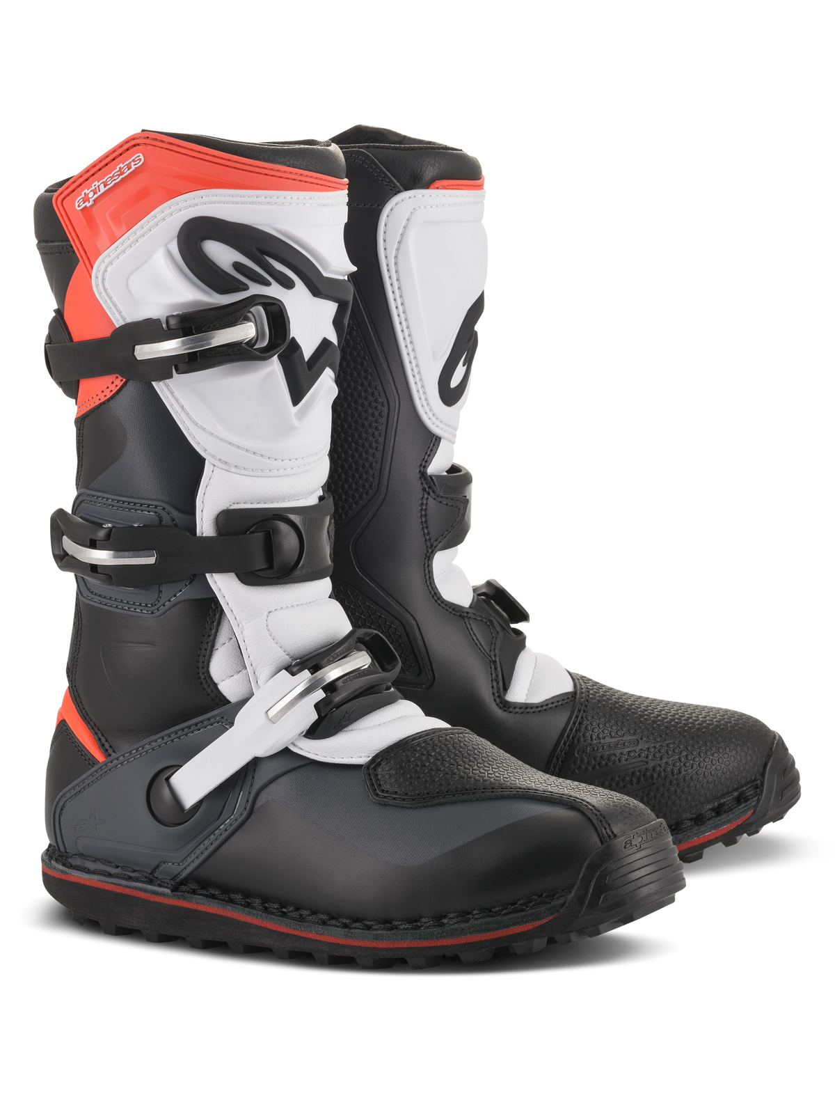 Bottes Alpinestars Tech-T, bottes de moto de trial, noir, blanc et rouge fluo, dotées d'un système de fermeture à triple boucle, d'une plaque protège-tibia ergonomique, d'une protection d'orteils texturée et d'une semelle à crampons à profil bas, design technique de chaussures tout-terrain