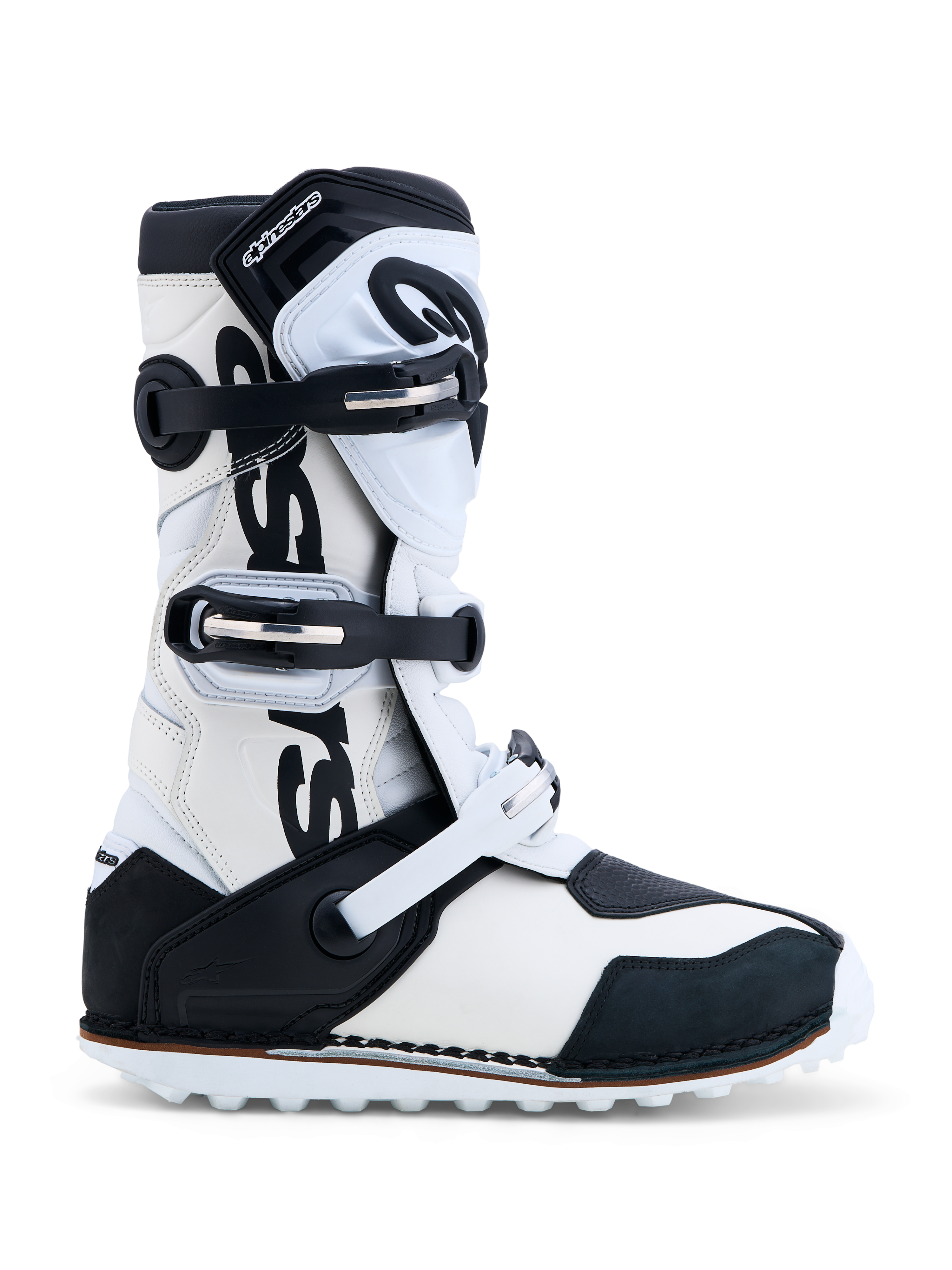 Alpinestars Tech-T, bottes de moto trial, noires et blanches, certifiées CE, plaque tibiale en TPU et construction en cuir.
