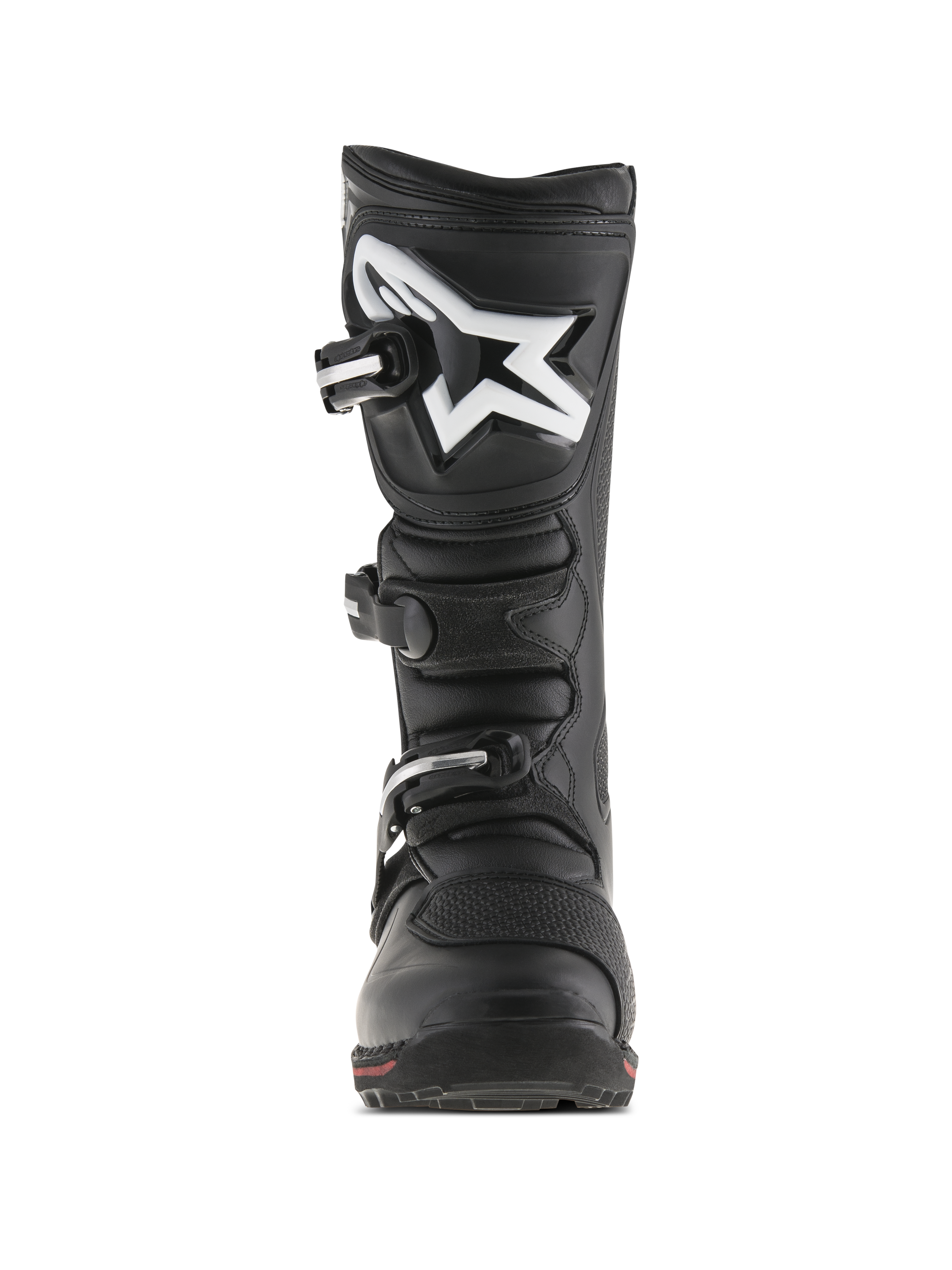 Bottes Alpinestars Tech-T, bottes de moto trial, noir et rouge, vue de face présentant une plaque tibiale ergonomique avec logo Astar blanc, système de fermeture à trois boucles et construction en cuir durable avec un accent rouge sur la semelle