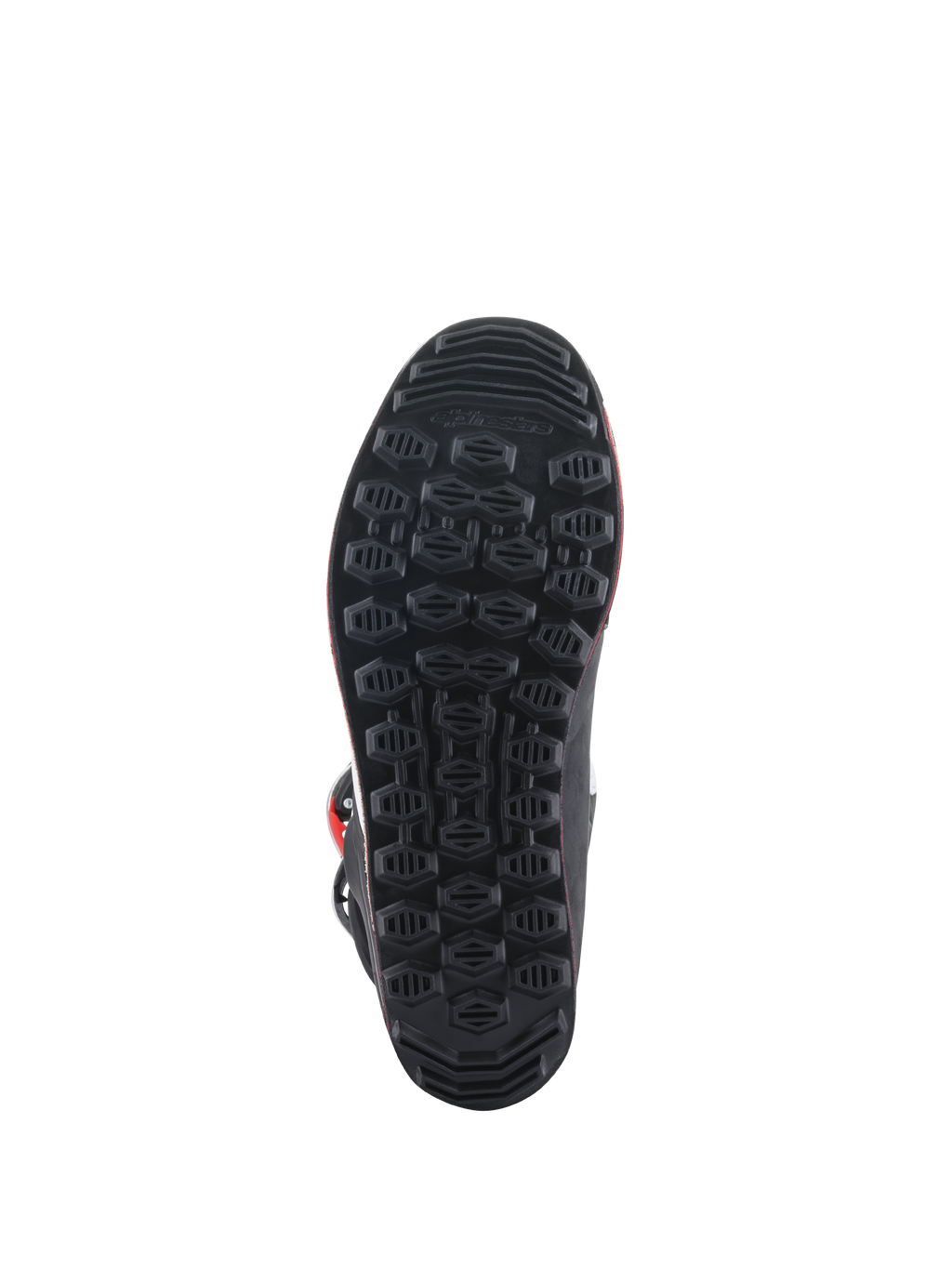 Bottes Alpinestars Tech-T, vue de la semelle, semelle extérieure en caoutchouc noir avec motif d'adhérence hexagonal texturé, conçue pour la sensibilité du pilotage trial et le contrôle des repose-pieds.