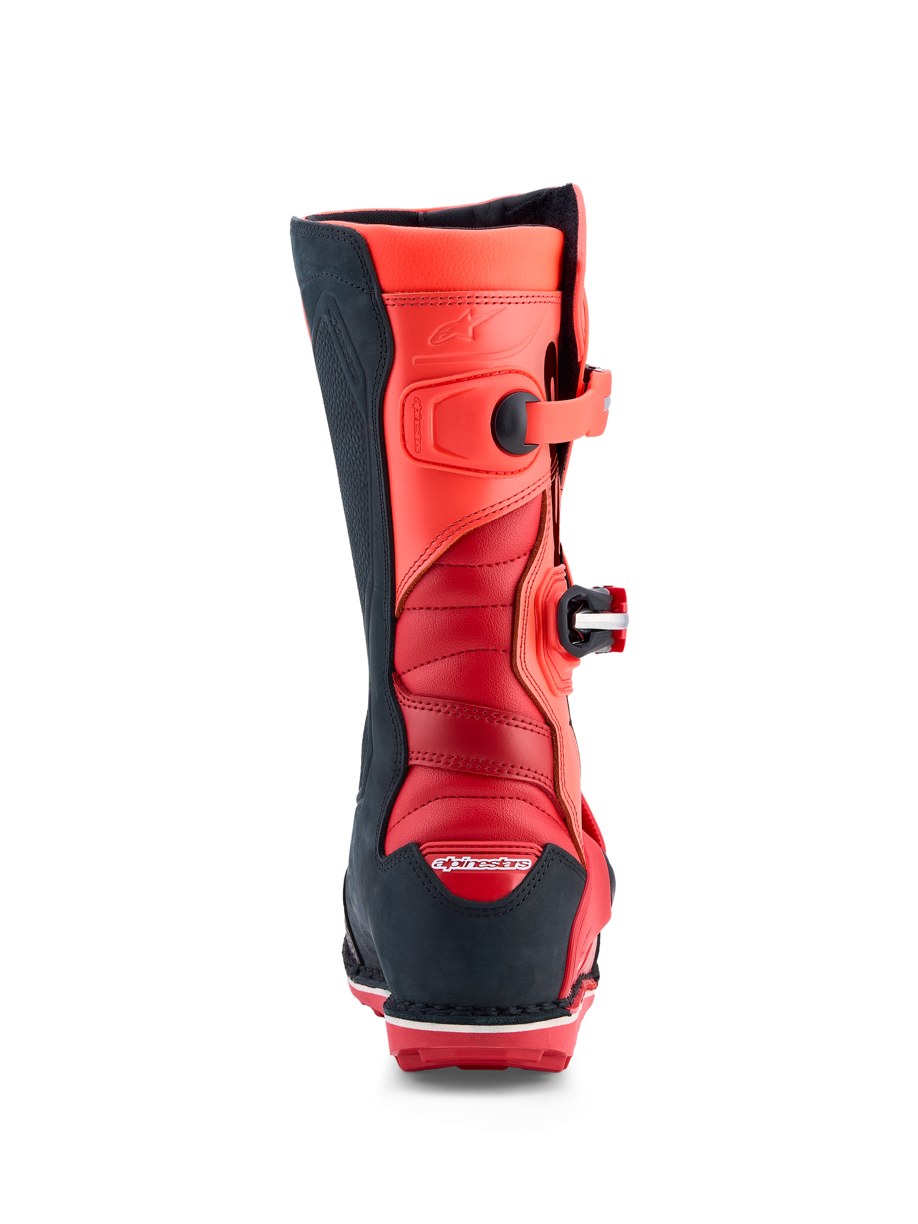 Alpinestars Tech-T, bottes de trial rouge fluo et noires, avec zones de flexion en accordéon et TPU certifié CE.