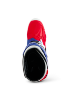 Bottes Alpinestars Limited Edition Fortitude Tech 10, bottes de motocross, rouge éclatant, blanc et bleu, vue de dessus montrant la pointe rouge et le col bleu avec intérieur rembourré noir, équipement de course tout-terrain durable