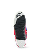 Alpinestars Limited Edition Fortitude Tech 10, vue de la semelle de la botte de motocross, motif d'adhérence texturé noir et blanc, insert central remplaçable, accents rouge, blanc et bleu, construction durable pour des performances tout-terrain